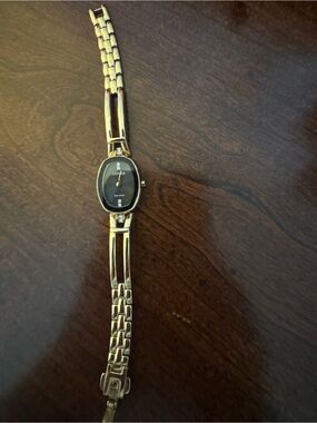 Citizen Gold Tone Bracelet Watch with Black Oval Dial